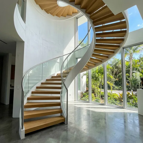 Completed curved cantilevered staircase in a NYC townhouse