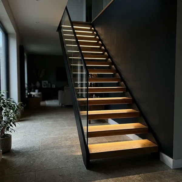 Integrated LED lighting in floating stair tread edges in a NYC interior